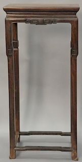 Oriental hardwood tall stand with carved frieze and stretcher base, hongmu,18th - 19th century or earlier.