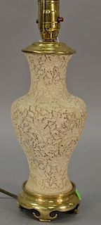 Chinese white cinnabar vase with carved blossoming flowers made into a table lamp. ht. 9in.