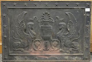 William H. Jackson French Empire style iron fireback with winged sphinxes and urn center, marked on back: Wm. H. Jackson & Company 2...