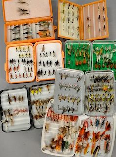 Seven fly boxes of salmon flies.
