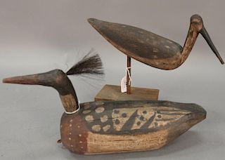 Two Jamie Reason carved decoys to include a root head red breasted merganser with horse hair crest and a root head willett, both mar...