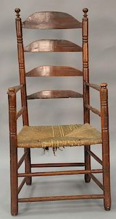 Primitive ladder back great chair having sausage turned supports and turned hand rests, (legs ended out). total ht. 47 1/4in.
