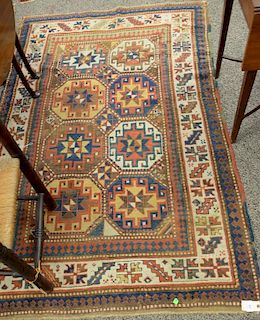 Caucasian Oriental throw rug, late 19th century (some wear). 4'3" x 6'7"