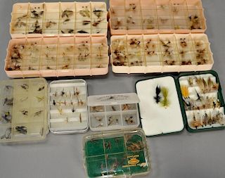 Nine fly boxes of mostly dry flies.