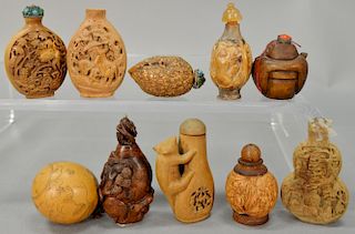 Ten Chinese snuff bottles including three walnut shells, boxwood, burlwood, and one gourd.  ht. 2 1/4in. to 3 1/4in.