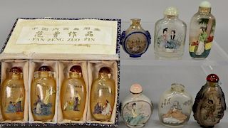 Ten inside painted glass/crystal snuff bottles, all having reverse painted Guanyin and scholar figures, most signed.  ht. 2 1/4in....