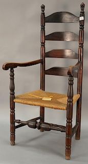 Primitive ladderback great chair having four slats, sausage turnings and bold turned stretchers with old hand written tag "4 slat ba...