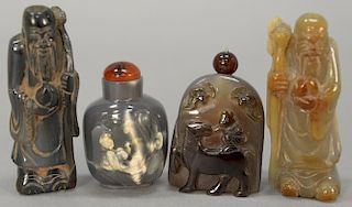 Four agate snuff bottles including two carved scholar figures, one with carved phoenix bird, and one carved with boy on horse and tw...