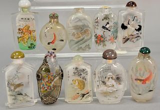 Ten inside painted glass/crystal snuff bottles, all reverse painted with figures, animals, and fish, most signed.  ht. 2 1/2in. to...