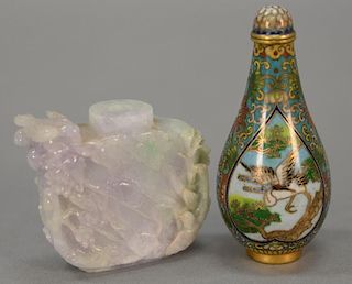 Two Chinese Oriental snuff bottles including a jadeite bottle with carved figures and birds and a cloisonne snuff bottle. ht. 2in. &...