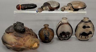 Seven overlay glass snuff bottles including two in the form of a turtle, one in the form of a beetle, three with pattern cut glass w...