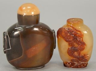 Two carved snuff bottles including one carnelian carved with dragon and the other agate master snuff.  ht. 2in. & 3in.