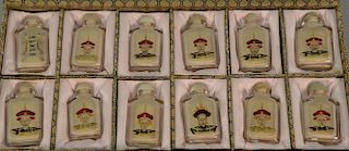 Set of twelve crystal reverse painted emperor and empress snuff bottles. hts. 3in. - 3 1/4in.