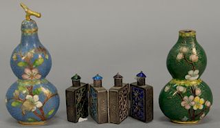Three snuff bottles to include a pair of cloisonne double gourd and a hinged metal enameled four part snuff bottle.  ht. 1 1/2in....