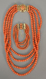 Chinese coral four strand beaded necklace and bracelet with gold clasp. necklace: lg. 17in.  bracelet: lg. 6in.  3.51 total t oz.