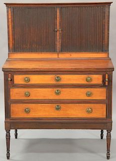 Sheraton mahogany and satinwood tambour desk, interior with four drawers and letter slots with two locking tambour doors having thre...