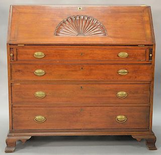 Chippendale cherry desk having slant lid with fan carving over cockbeaded drawers, all set on ogee feet, Connecticut circa 1770. ht....