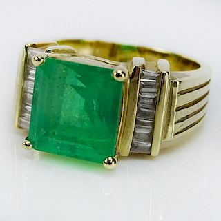 CGI Certified 4.24 Carat Square Step Cut Colombian Emerald, .42 Carat Baguette Cut Diamond and 14 Karat Yellow Gold Ring