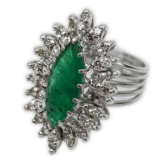 Vintage Marquise Cut Emerald, Round Cut Diamond and 14 Karat White Gold Ballerina Ring.