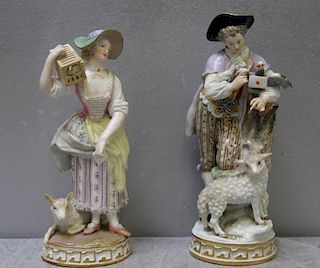MEISSEN. 2 porcelain Figures Holding Animals