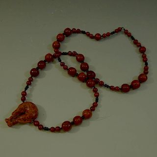 VINTAGE CARVED HORSE RED AMBER COLOR BEADS NECKLACE