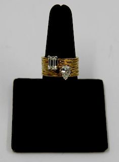 JEWELRY. Modernist 18kt Gold and Diamond Ring.