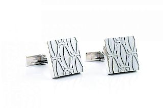 A Pair of Silver Cufflinks, by Cartier