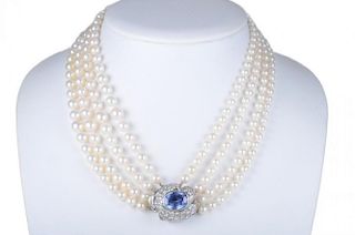 A Pearl Necklace with Sapphire and Diamond Clasp, by Seaman Schepps