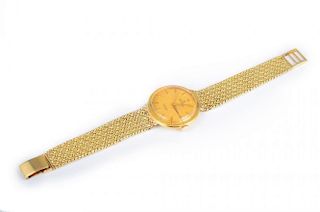 A Vintage Men's Gold Watch, by Rolex