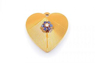 A Diamond and Sapphire Heart-Shaped Gold Pendant, by Tiffany & Co.