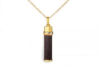 A Gold and Wood Pendant Necklace, by Cartier