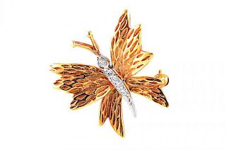 A Diamond Butterfly Pin, by Tiffany & Co.