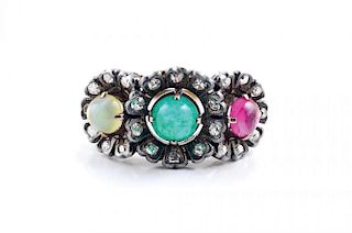 An Antique Ruby, Emerald, and Cat's Eye Ring
