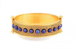 An Antique Etruscan Gold and Lapis Hinged Bangle