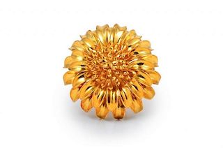 A Gold Flower Pin, by Cartier