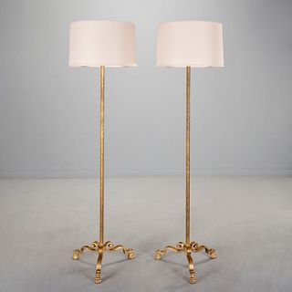Maison Bagues, pair gilt iron floor lamps