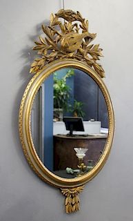 Gilt Mirror with Stringed Instrument Decoration.