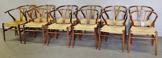 Set of 12 Midcentury Hans Wegner Wishbone Chairs.