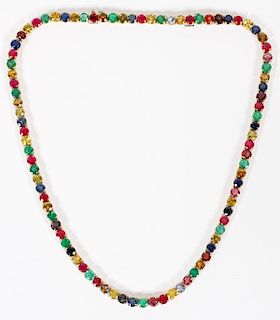GOLD AND 52CT RUBY SAPPHIRE AND EMERALD NECKLACE