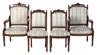 A Louis XVI Style Walnut Parlor Suite Height of canapé 43 x width 61 1/2 x depth 29 inches.