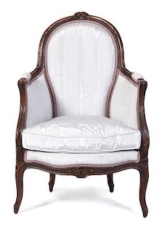 An Upholstered Armchair Height 37 1/2 inches.