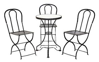 A French Cafe Table and Three Chairs Height of table 29 x diameter 19 3/4 inches.
