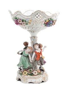 A Von Schierholz Porcelain Figural Compote Height 14 3/4 inches.