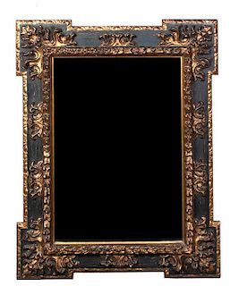 A Continental Painted and Gilt Mirror Height 55 1/2 x width 44 inches.