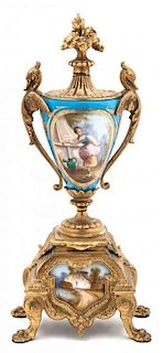 A Gilt Bronze Mounted Sevres Style Porcelain Urn Height 12 inches.