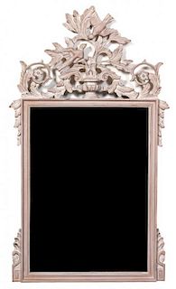 A Rococo Style Painted Mirror Height 39 x width 22 1/2 inches.