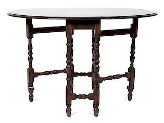 A Gate Leg Table Height 30 1/2 inches.