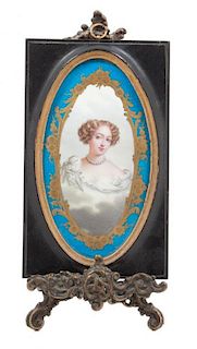 A Porcelain Portrait Plaque Height of frame 7 1/4 x width 4 1/2 inches.