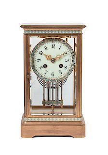 A Brass and Enamel Mantel Clock Height 10 1/2 inches.