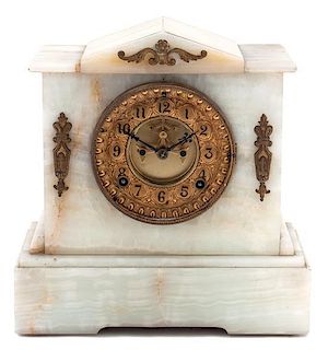 An Ansonia Gilt Metal and Onyx Mantel Clock Height 11 inches.